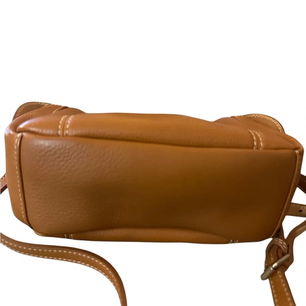 Dooney & Bourke Pebbled Grain Pocket Sac Crossbody with Side Pockets.